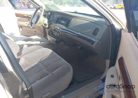 2003 Mercury Grand Marquis Gs z USA, uszkodzony, nr VIN 2MEFM74W33X698646